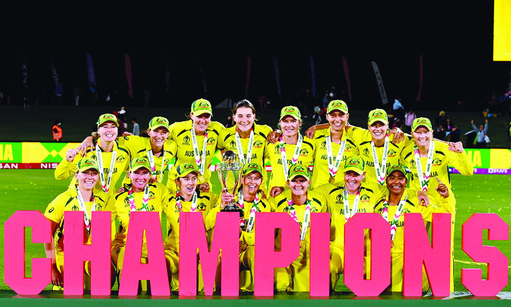 CHRISTCHURCH: Australian team celebrate their victory with the trophy after the 2022 Women's Cricket World Cup final match between England and Australia at the Hagley Park Oval on April 3, 2022. – AFP