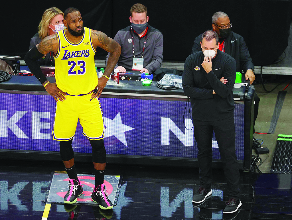 ATLANTA: In this file photo taken on Feb 1, 2021, Head Coach Frank Vogel of the Los Angeles Lakers stands with LeBron James #23 against the Atlanta Hawks during the second half at State Farm Arena. - AFP