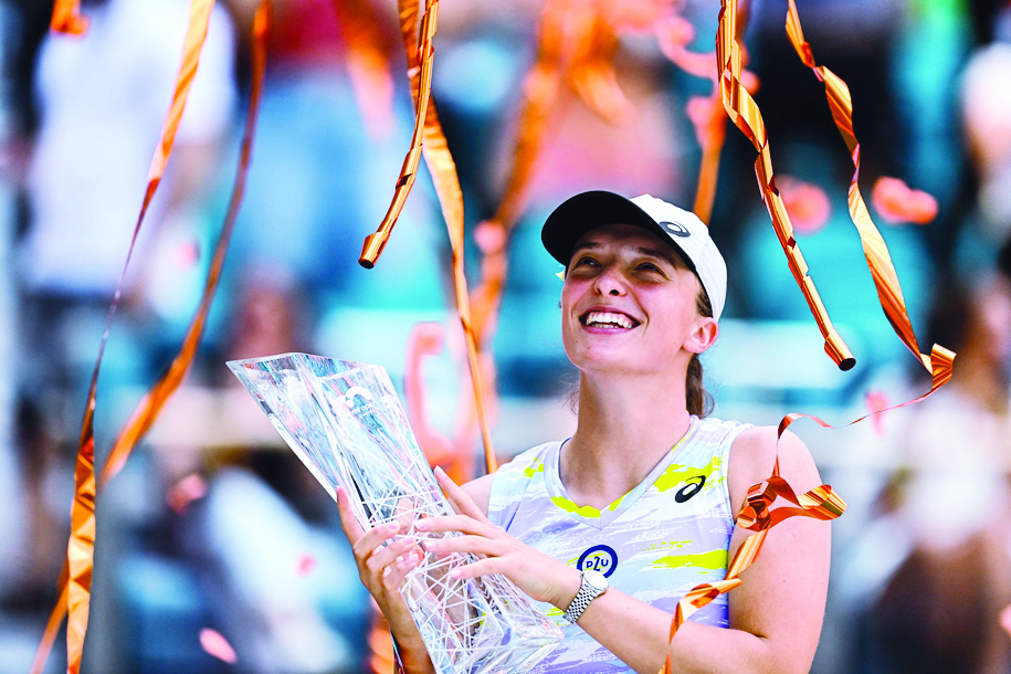 MIAMI GARDENS, Florida: Poland's Iga Swiatek poses with her trophy after winning the 2022 Miami Open at Hard Rock Stadium on April 2, 2022. - AFP