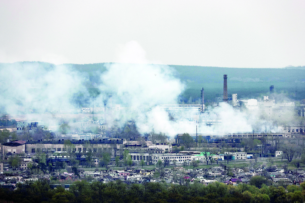 NOVODRUZHESK: A photograph taken from Novodruzhesk village, shows smoke rising in Rubizhne city, on April 18, 2022, on the 54th day of the Russian invasion of Ukraine. - AFP