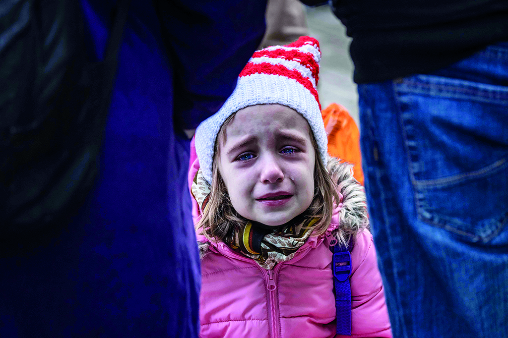 KRAMATORSK: A young girl cries before the train leaves the eastern city of Kramatorsk, in the Donbas region. - AFP