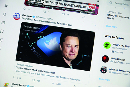 CHICAGO: In this photo illustration, news about Elon Musk's bid to takeover Twitter is tweeted on April 25, 2022 in Chicago, Illinois. - AFP