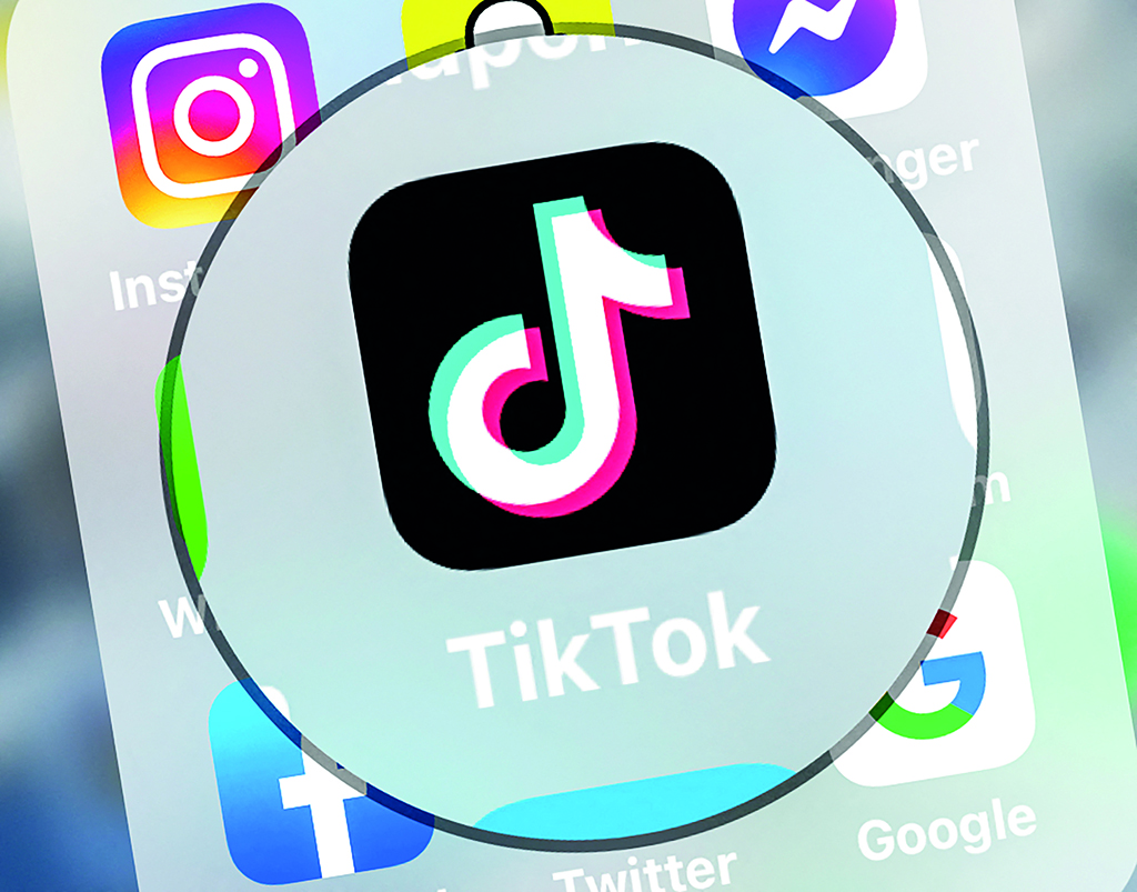 LILLE: The logo of the networking application TikToK is displayed on a tablet in Lille, northern France. The networking application TikTok says suspending posting of new videos from Russia. - AFP