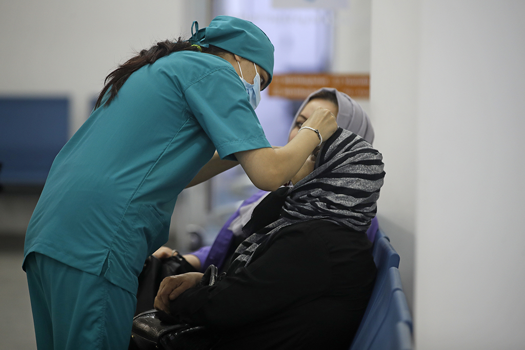 BAGHDAD: A medic administers drops to a patient at the Beirut Eye and ENT specialist hospital in the Iraqi capital Baghdad. Once synonymous with conflict and chaos, Iraq is becoming a land of opportunity for Lebanese expatriates fleeing a deep economic crisis back home. - AFP