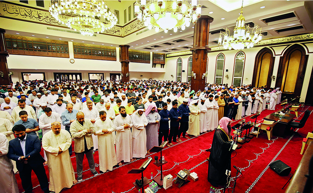 KUWAIT: Muslim men pray at a mosque in Kuwait City just before daybreak, during Laylat Al-Qadr or Night of Destiny, during the holy month of Ramadan on early on April 28, 2022. Laylat Al-Qadr, marks the night Muslims believe the first verses of the Quran were revealed to the Prophet (PBUH) through the archangel Gabriel. - Photo by Yasser Al-Zayyat