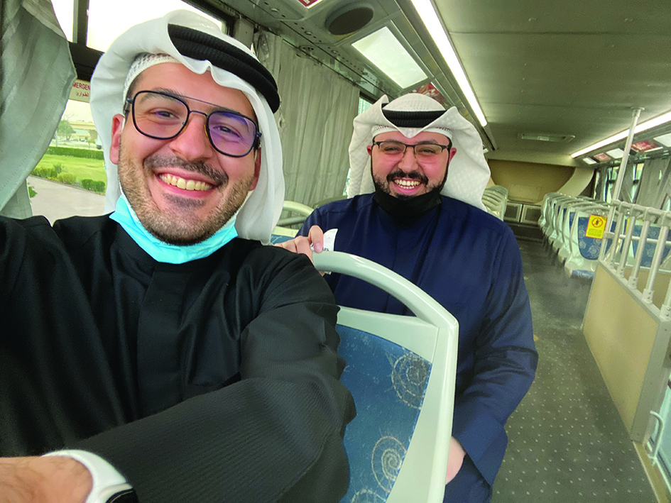 KUWAIT: Jassim Al-Awadhi (left) with MP Abdul-Aziz Al-Saqabi using public transportation.