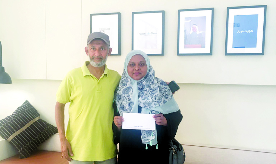 Fatima Abdulwahab with her father after receiving the award.