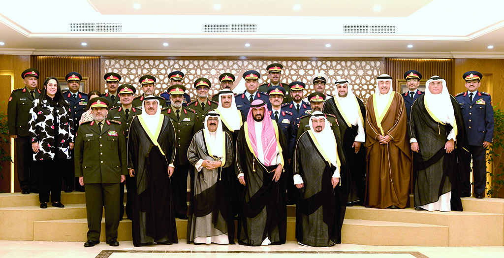 KUWAIT: His Highness the Crown Prince Sheikh Mishal Al-Ahmad Al-Jaber Al-Sabah poses for a group picture during his visit to the Army Officers Club. - Amiri Diwan photos