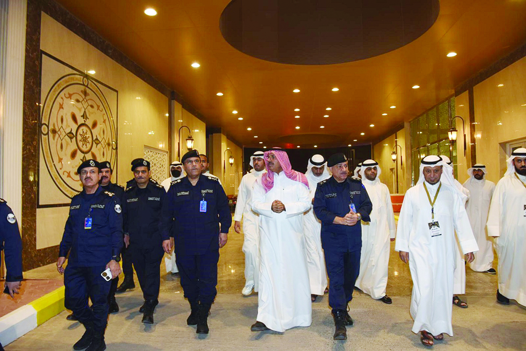 KUWAIT: First Deputy Prime Minister and Minister of Interior General Sheikh Ahmad Nawaf Al-Ahmad Al-Sabah tours a security post at a mosque on Wednesday. - KUNA