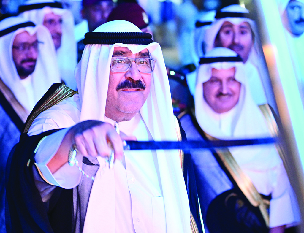 His Highness the Crown Prince Sheikh Mishal Al-Ahmad Al-Jaber Al-Sabah performs the traditional Ardha dance.