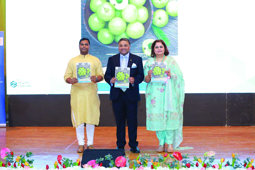 KUWAIT:  Indian Ambassador Sibi George, accompanied by First Secretary Dr Vinod Gaikwad (left) and ambassador's spouse Joice Sibi (right) releases the 'Ayush' bulletin for the period January-March 2022.
