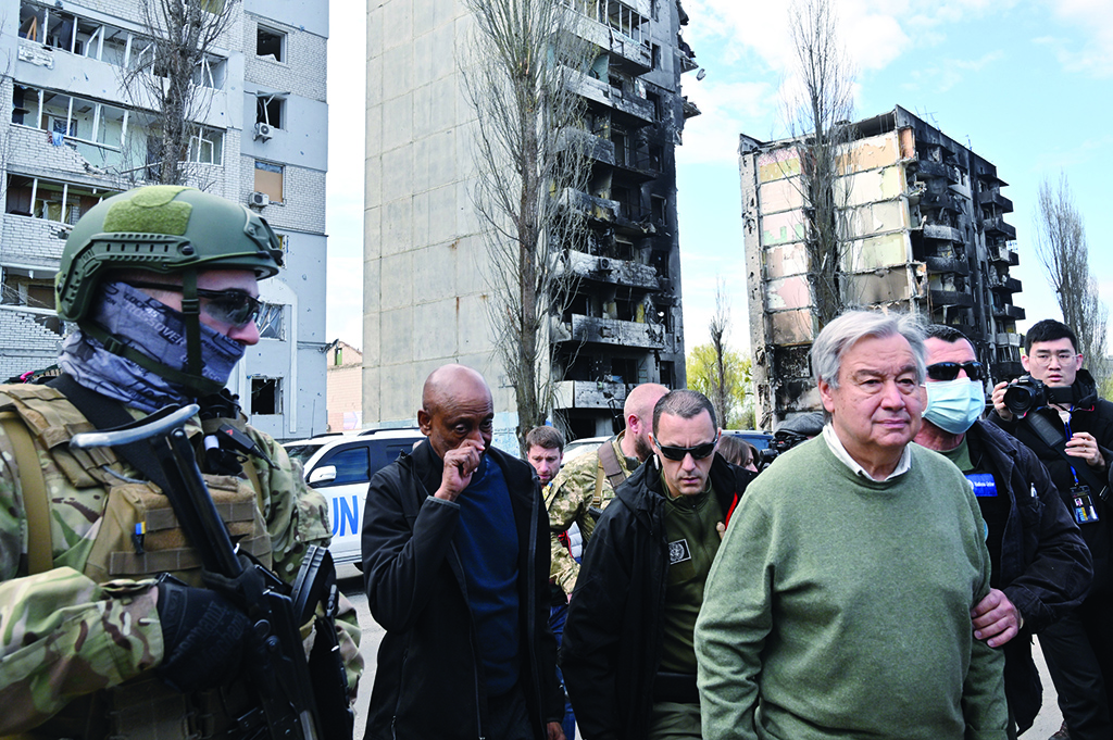 BORODIANKA, Ukraine: UN Secretary-General Antonio Guterres (3R) walks during his visit in Borodianka, outside Kyiv, on April 28, 2022. UN Secretary-General Antonio Guterres arrived to the town of Borodianka outside Kyiv where Russian forces were accused of having killed civilians, an AFP journalist on the scene reported. - AFP