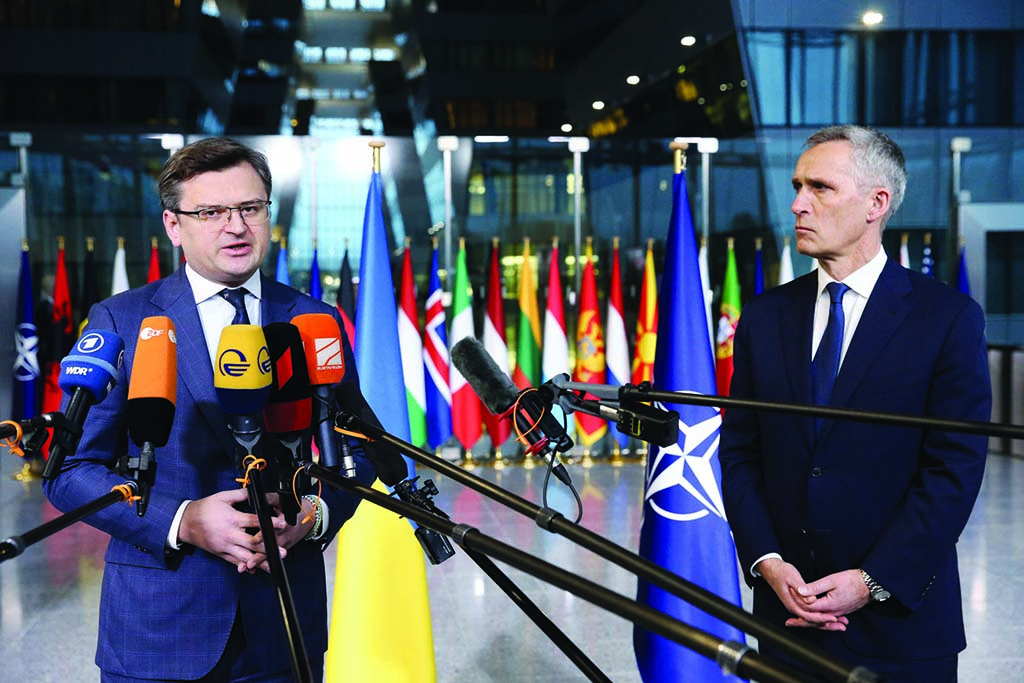BRUSSELS: Ukraine's Foreign Minister Dmytro Kuleba (L) and NATO Secretary General Jens Stoltenberg speak to the press as they arrive for a meeting of NATO foreign ministers at NATO headquarters, in Brussels, on April 7, 2022.-AFP
