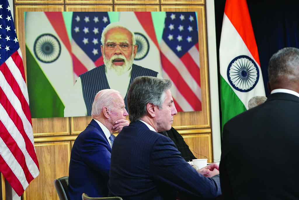 WASHINGTON: US President Joe Biden (L) alongside US Secretary of Defense Lloyd Austin (R) and US Secretary of State Antony Blinken (C), takes part in a virtual meeting with India's Prime Minister Narendra Modi in Washington. - AFP