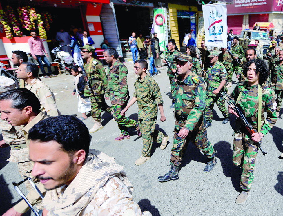 SANAA: Forces loyal to Yemen's Huthi rebels take part in a military parade marking the seventh anniversary of the Saudi-led coalition's intervention in their country, in the capital Sanaa, on March 31, 2022. - AFP