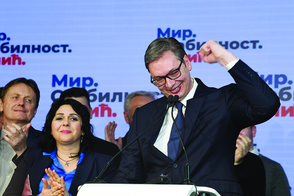BELGRADE, Serbia: Serbian President Aleksandar Vucic addresses the public after the first unofficial results of the general elections were known, in Belgrade. - AFP