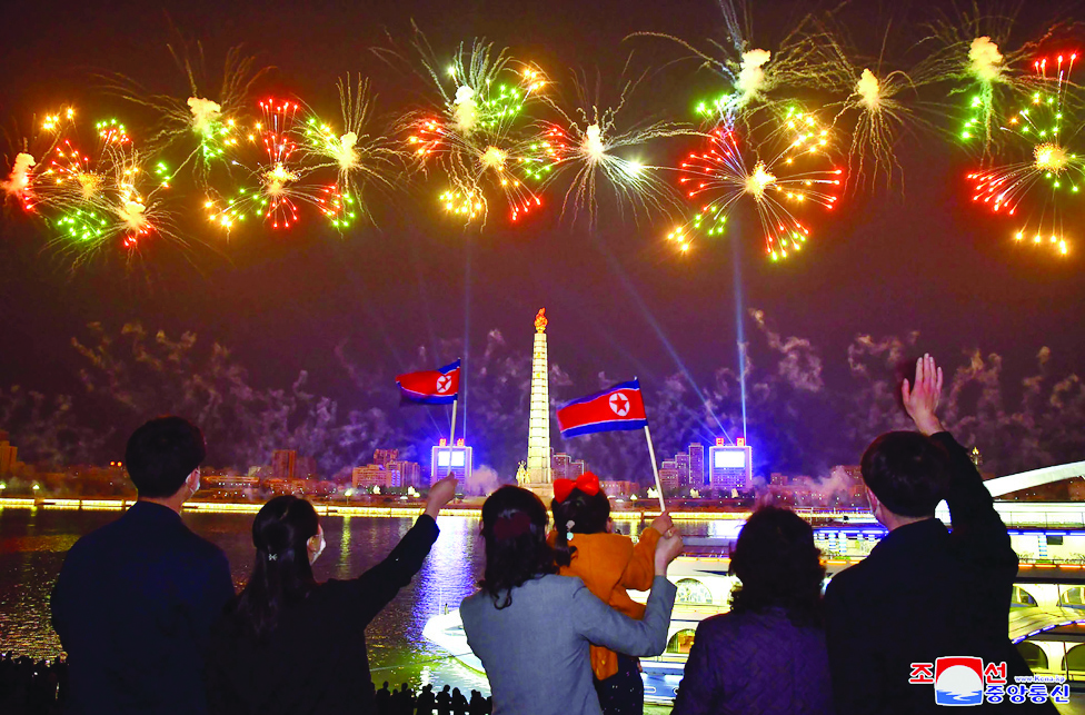 PYONGYANG, North Korea: Photo released from North Korea's official Korean Central News Agency (KCNA) on April 16 shows a fireworks display over the Taedong river and Juche tower to mark the Day of the Sun, the 110th birth anniversary of late North Korean leader Kim Il Sung, in Pyongyang. - AFP