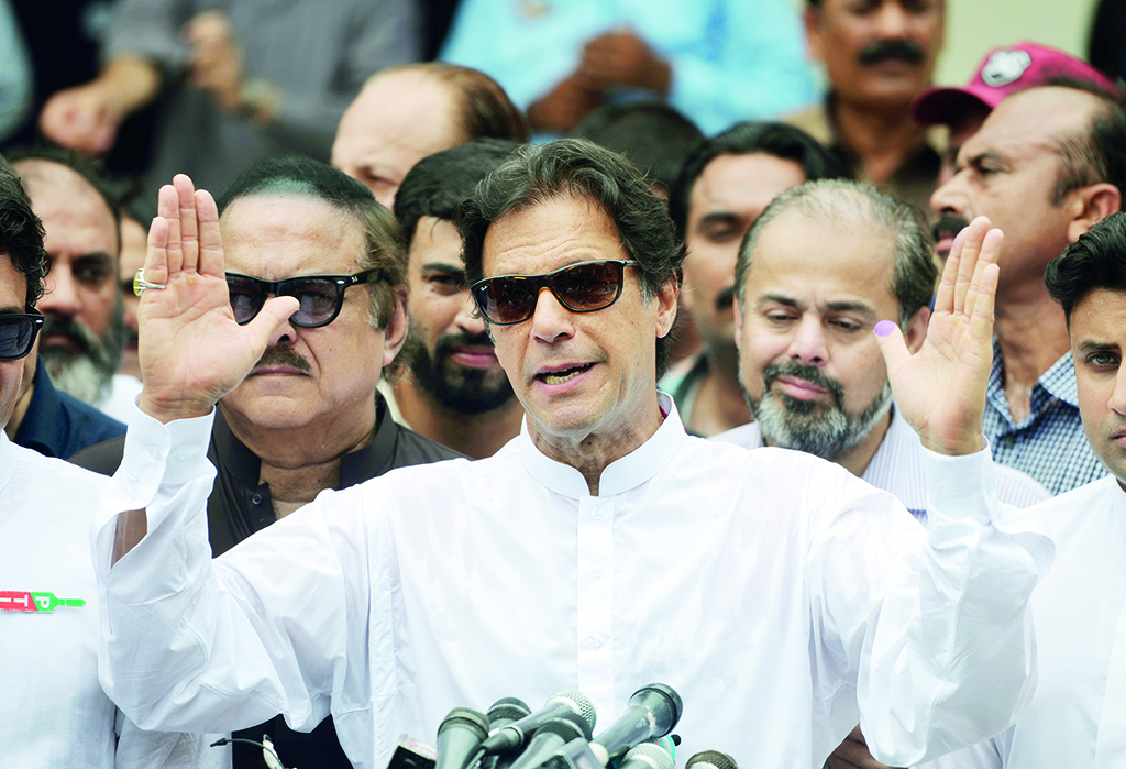 ISLAMABAD: In this file photo, Pakistan's cricketer-turned politician Imran Khan of the Pakistan Tehreek-e-Insaf (Movement for Justice) speaks to the media during the general election in Islamabad. Khan was dismissed on April 10, 2022 as Pakistan's prime minister after losing a no-confidence vote in parliament following weeks of political turmoil.- AFP