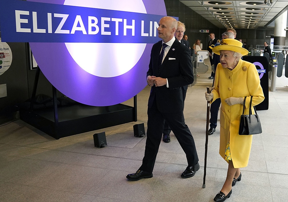 Britain's Queen Elizabeth II (right) visits Paddington Station in London on Tuesday, to mark the completion of London's Crossrail project, ahead of the opening of the new 'Elizabeth Line' rail service next week.—AFP photos  