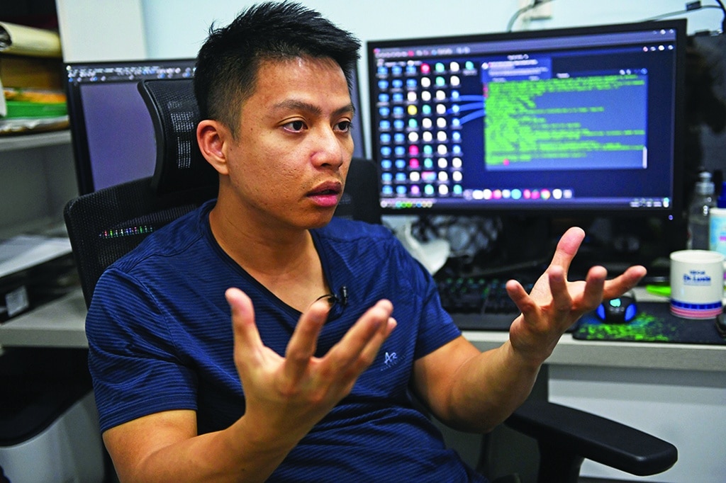 This photo shows cybersecurity expert Ngo Minh Hieu during an interview with AFP in Ho Chi Minh City. –AFP photos