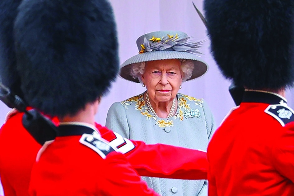 In this file photo Britain's Queen Elizabeth II watches a military ceremony to mark her official birthday at Windsor Castle in Windsor. – AFP photos