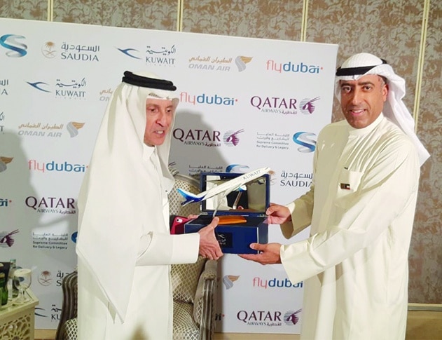 KAC CEO Ma'n Razouqi presenting a memorial shield to Akbar Al-Baker Qatar, Airways Group Chief Executive.