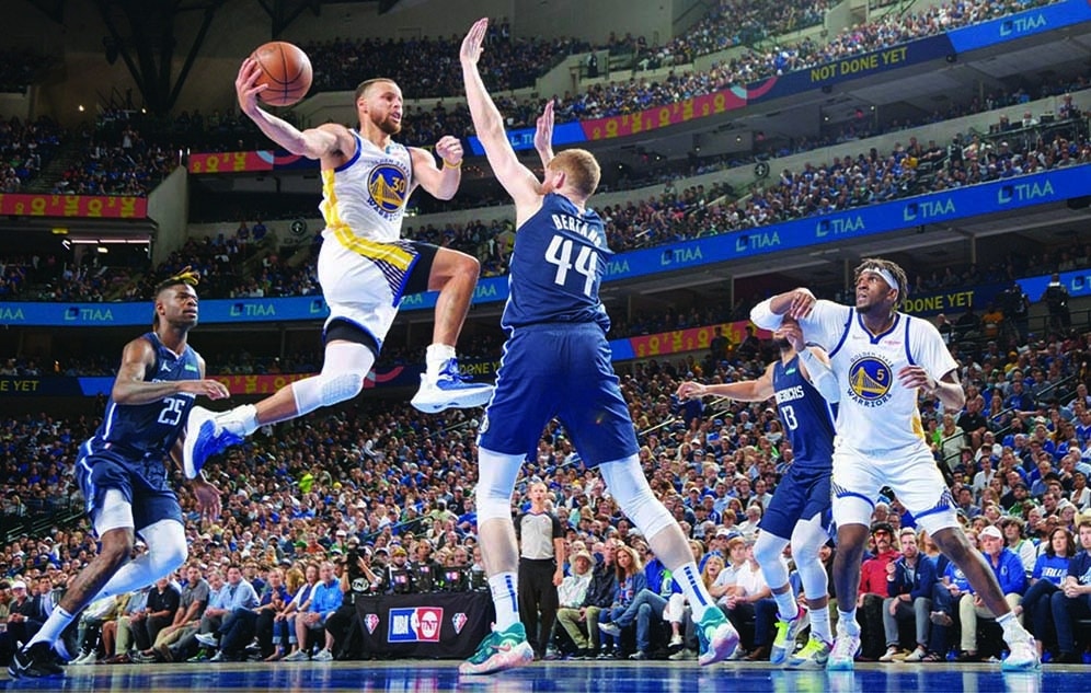 DALLAS: Stephen Curry #30 of the Golden State Warriors shoots the ball during Game 3 of the 2022 NBA Playoffs Western Conference Finals against the Dallas Mavericks on May 22, 2022.- AFP
