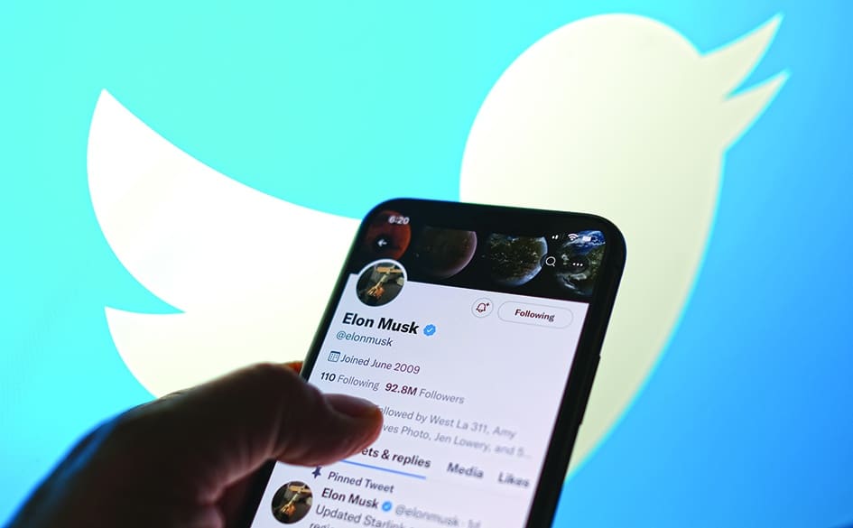 LOS ANGELES: This illustration photo taken May 13, 2022, displays Elon Musk’s Twitter account with a Twitter logo in the background in Los Angeles. – AFP