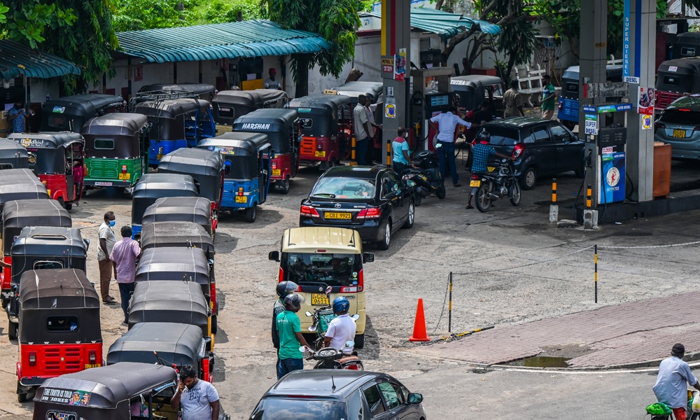 COLOMBO: Motorists queue up to buy fuel at a Ceylon Petroleum Corporation fuel station in Colombo on May 2, 2022.— AFP
