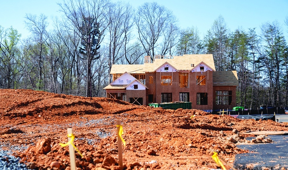 FALLS CHURCH, US: In this file photo, a home under construction in a new housing development in Falls Church, Virginia. US new home sales plunged 16.6 percent in April, even as prices continued to climb, according to government data released on May 24, 2022. - AFP