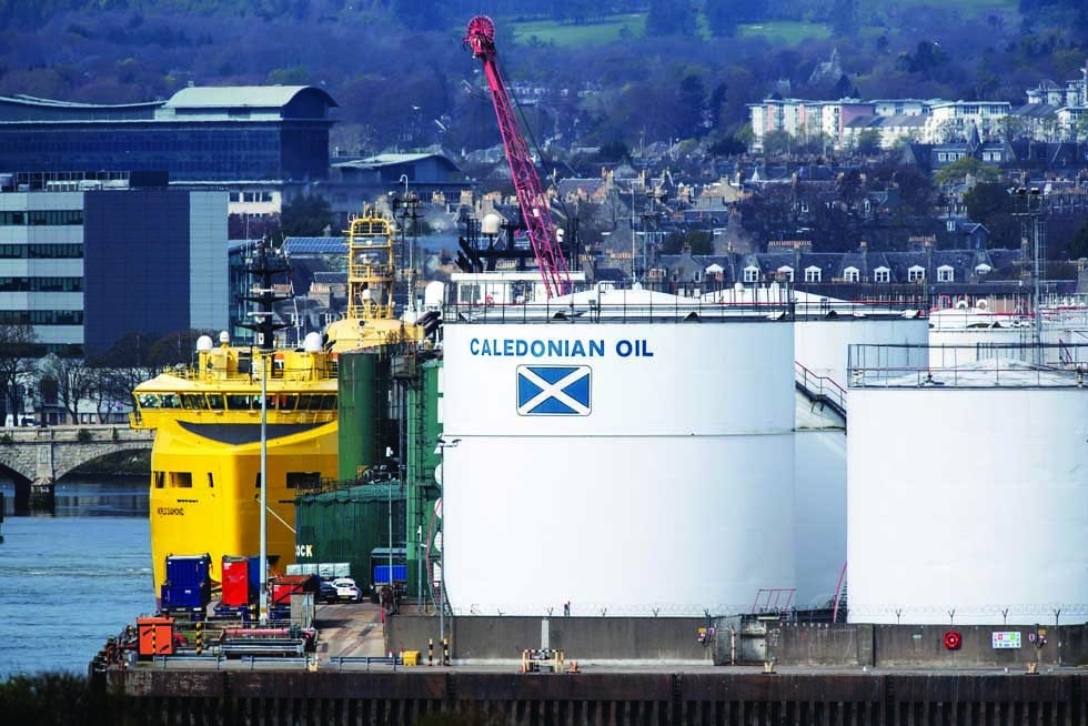 ABERDEEN, UK: In this file photo taken on April 29, 2022 supply vessels used in the oil, gas and renewable energy industry are docked by the Caledonian Oil's tank, at the Aberdeen Harbour, in the North East of Scotland. - AFP