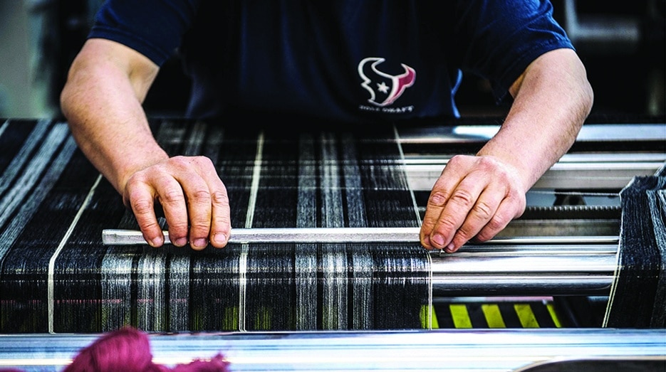 A worker takes care of the creation of a tartan at the Great Scot textile company in Keith, in the North Ease of Scotland. At a tartan workshop in northeast Scotland, machines slowly unwind miles of the familiar criss-cross patterns of fabric in green, red, black, blue and white. – AFP photos