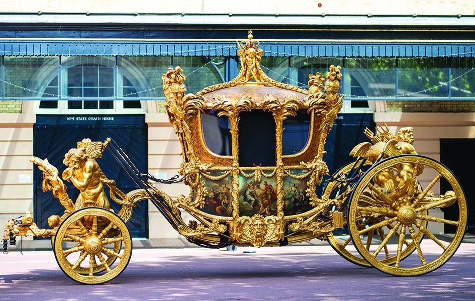  A photograph shows a general view of the Gold State Coach, at the Royal Mews, in Buckingham Palace, in London, which will be used for the Queen’s Platinum Jubilee celebrations. - AFP