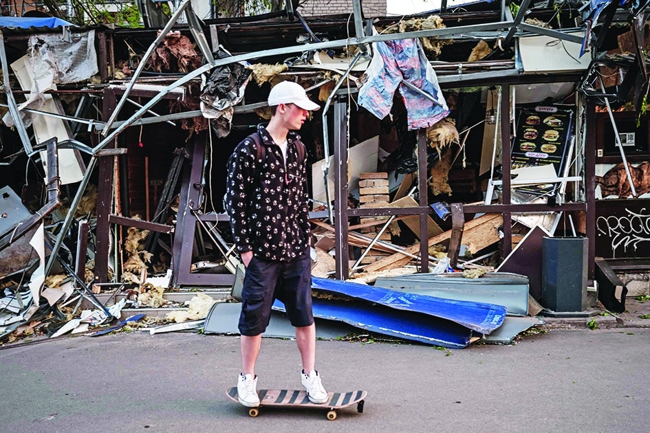 Roman Kovalenko, 18, skates next to the damaged shop by a missile explosion in the morning as he always skates alone since all his friends have fled at Peace Square in Kramatorsk, eastern Ukraine, amid the Russian invasion of Ukraine. – AFP photos