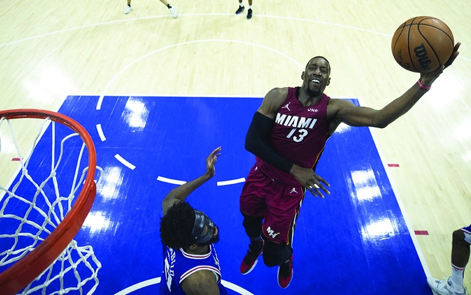 PHILADELPHIA: Bam Adebayo #13 of the Miami Heat shoots the ball against Joel Embiid #21 of the Philadelphia 76ers in the second half during Game Three of the 2022 NBA Playoffs Eastern Conference Semifinals at the Wells Fargo Center on May 6, 2022.- AFP