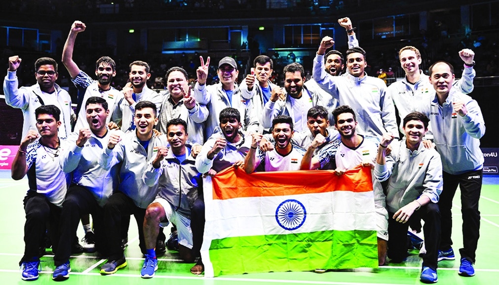 BANGKOK: Members of the Indian men's badminton team celebrate after defeating Indonesia in the men's finals of the Thomas and Uber Cup badminton tournament on May 15, 2022. – AFP