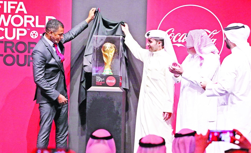 KUWAIT: Former Brazilian World Cup winner and footballer Gilberto Silva unveils the FIFA World Cup trophy during a trophy tour at Sheikh Jaber Al-Ahmad Cultural Centre on May 16, 2022. - Photo by Yasser Al-Zayyat