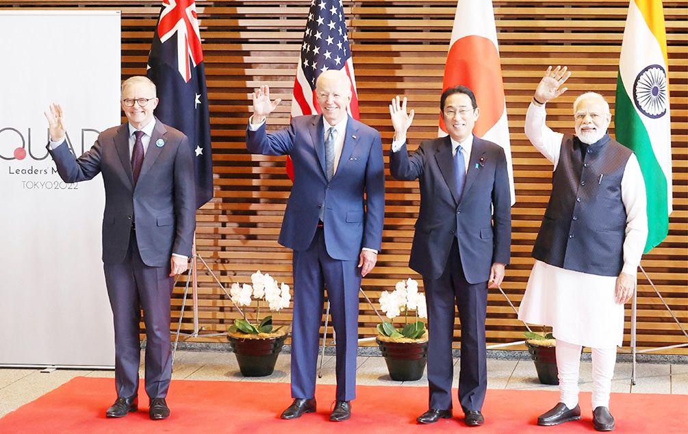 TOKYO: (From left) Australian Prime Minister Anthony Albanese, US President Joe Biden, Japanese Prime Minister Fumio Kishida and Indian Prime Minister Narendra Modi wave to the media prior to the Quad meeting at Kishida's office on May 24, 2022. - AFP