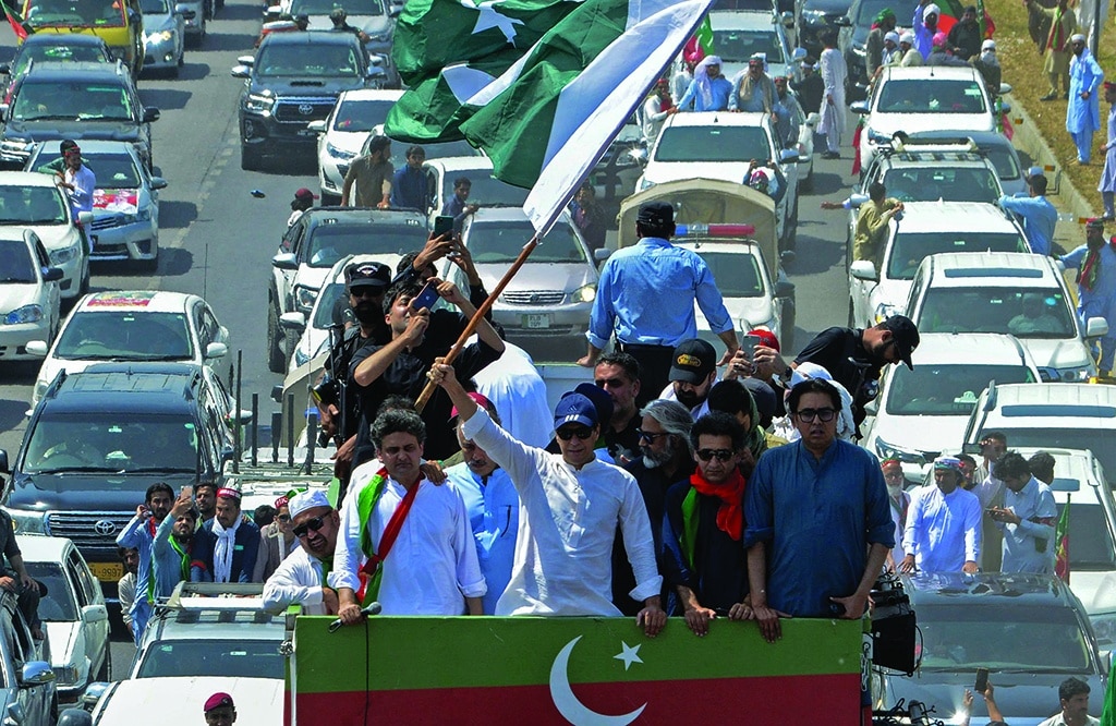 SWABI, Pakistan: Pakistan's former prime minister Imran Khan, along with supporters, takes part in a protest rally on May 25, 2022. - AFP