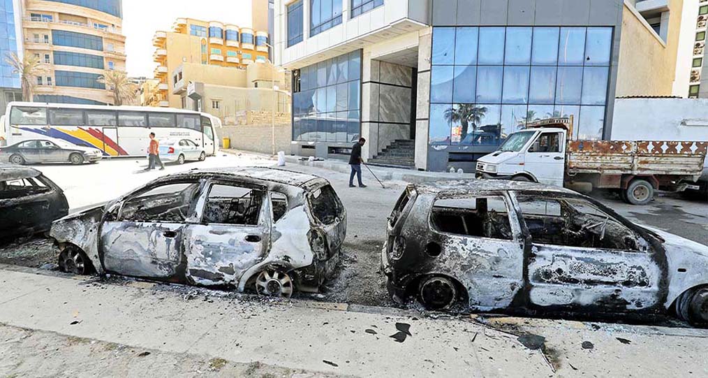 TRIPOLI: This picture taken in Libya's capital Tripoli shows a view of vehicles destroyed during fighting between forces loyal to the Tripoli-based Prime Minister Abdulhamid Dbeibah and rival forces of the Tobruk-based government.- AFP