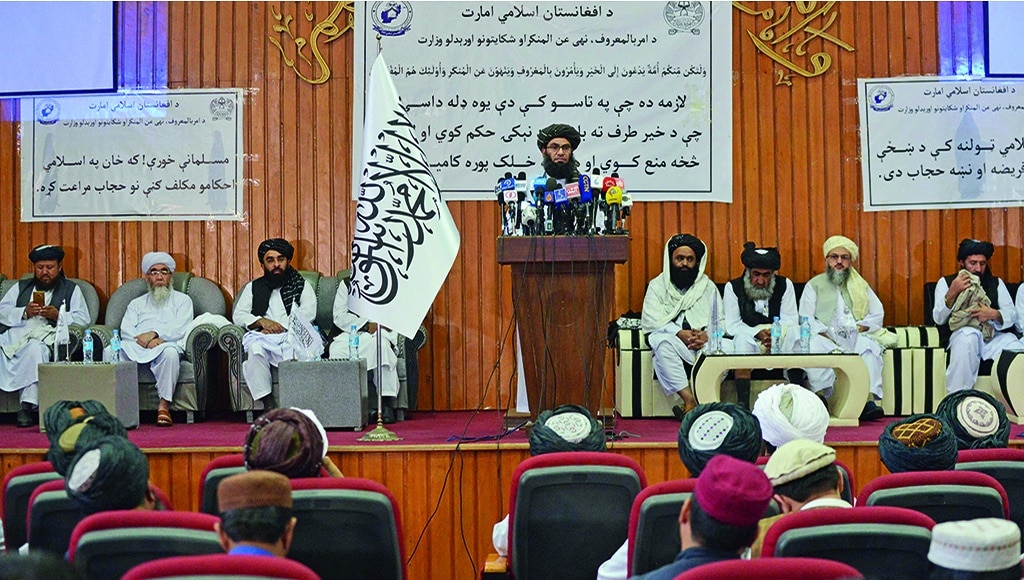 KABUL: Taleban minister for Promotion of Virtue and Prevention of Vice Mohammad Khalid Hanafi speaks during a ceremony to announce a decree for Afghan women's dress code on May 7, 2022. - AFP
