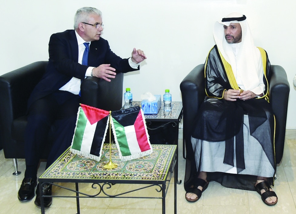 KUWAIT: Palestinian Ambassador to Kuwait Rami Tahboub (left) speaks with Kuwait's National Assembly Speaker Marzouq Al-Ghanem at the Embassy of Palestine on Sunday. - Photos by Yasser Al-Zayyat