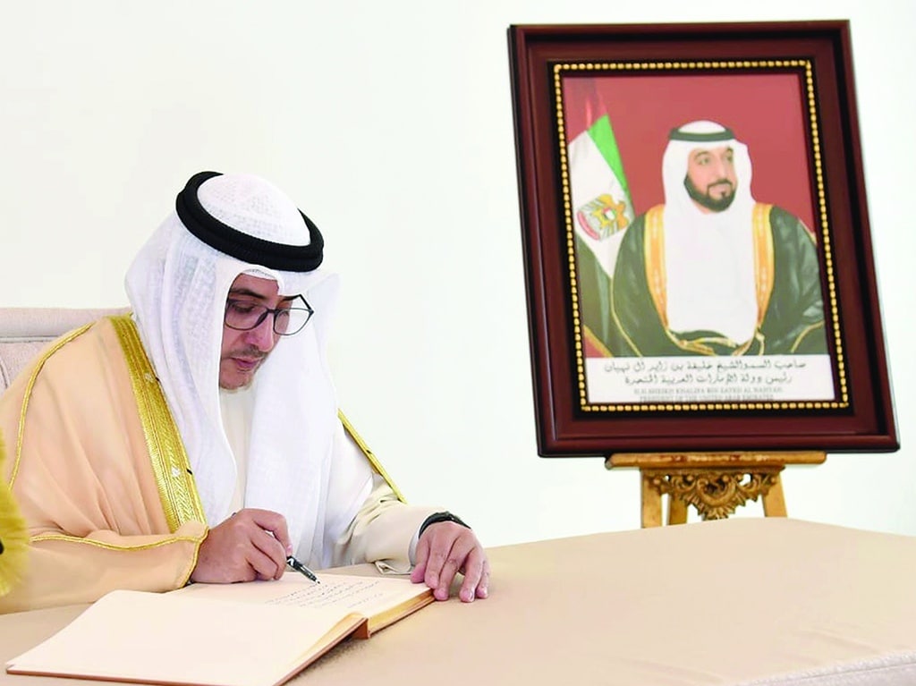 KUWAIT: Kuwaiti Foreign Minister Sheikh Ahmad Nasser Al-Mohammad Al-Sabah writes in a book of condolences at the UAE Embassy in Kuwait City on May 14, 2022. – Photos by Yasser Al-Zayyat