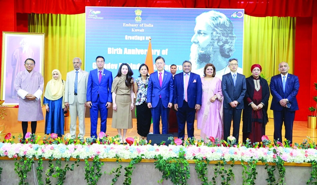 KUWAIT: Indian Ambassador Sibi George poses for a group photo with members of the diplomatic community in Kuwait during the birth anniversary celebration of Rabindranth Tagore at the Indian embassy on Saturday.