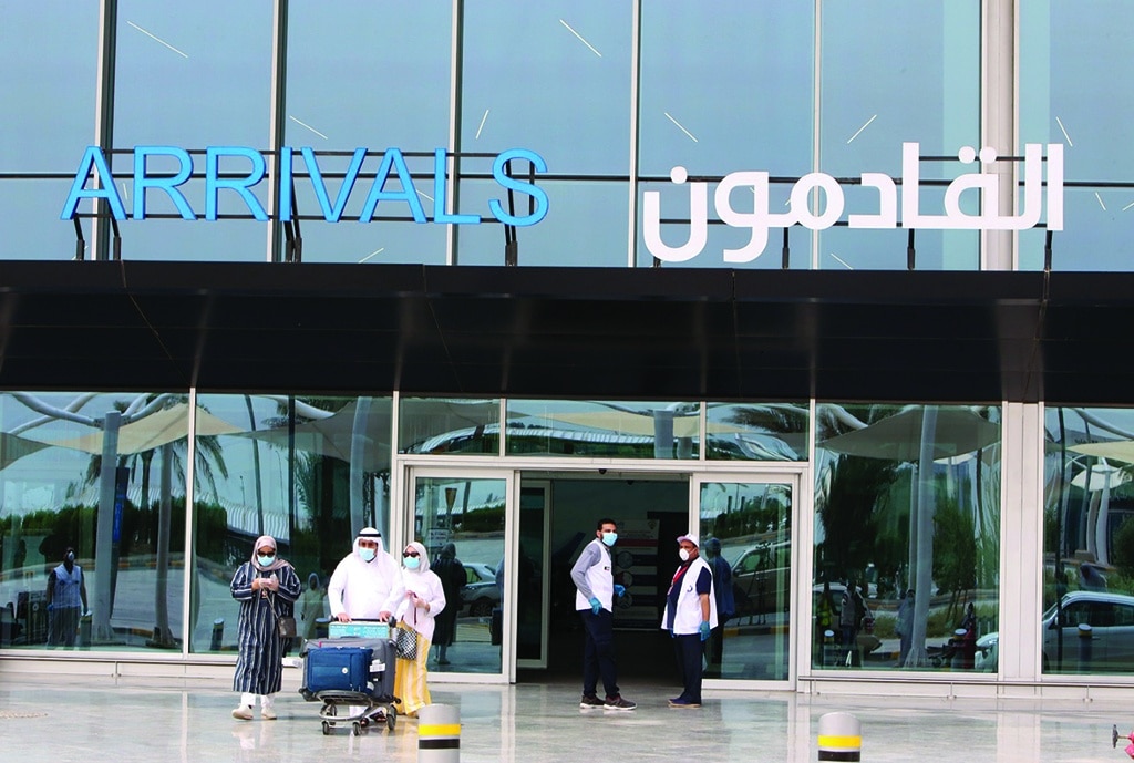 KUWAIT: This file photo shows people leaving Kuwait International Airport. - Photo by Yasser Al-Zayyat