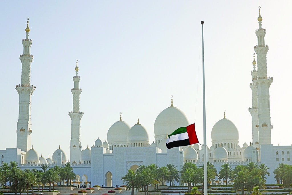 ABU DHABI: The flag of United Arab Emirates flies at half-mast outside the Sheikh Zayed Grand Mosque in Abu Dhabi on May 13, 2022. - AFP