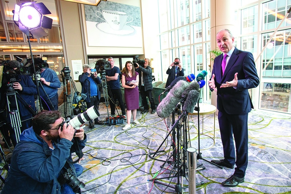 BELFAST, UK: Ireland's Prime Minister Micheal Martin speaks with members of the media after a series of meetings with the main Stormont parties to discuss the Northern Ireland Protocol and the assembly crisis, at the Grand Central Hotel in Belfast.—AFP