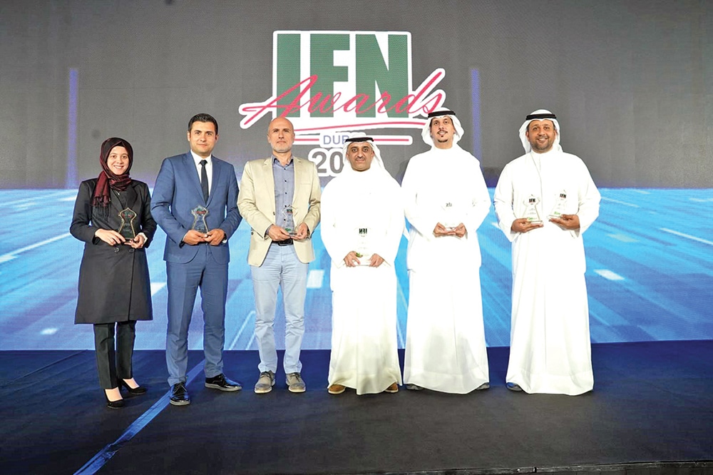 KFH, KFH Turkey and KFH Capital officials with the awards.