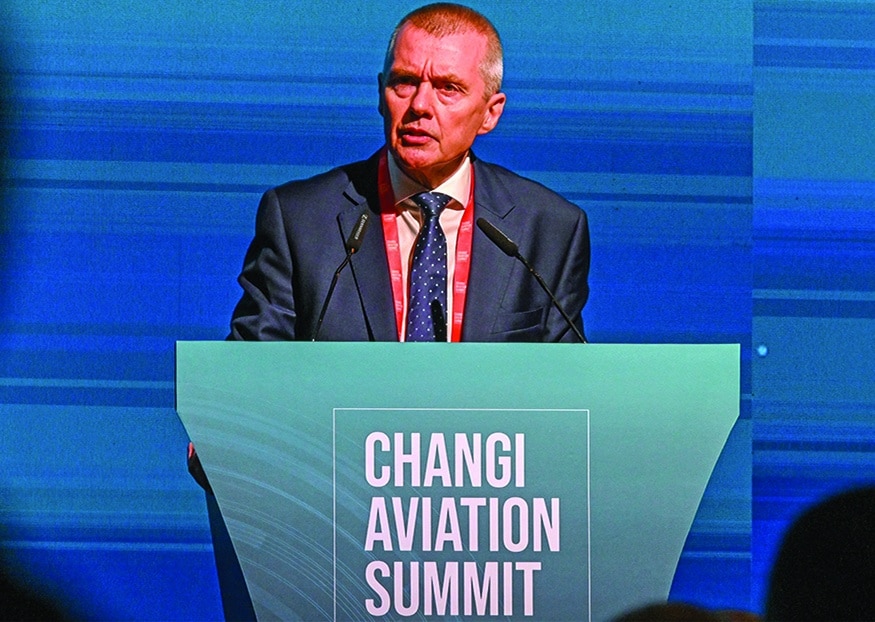 SINGAPORE: Director General of the International Air Transport Association (IATA) Willie Walsh delivers his keynote address at the Changi Aviation Summit in Singapore on May 17, 2022. – AFP