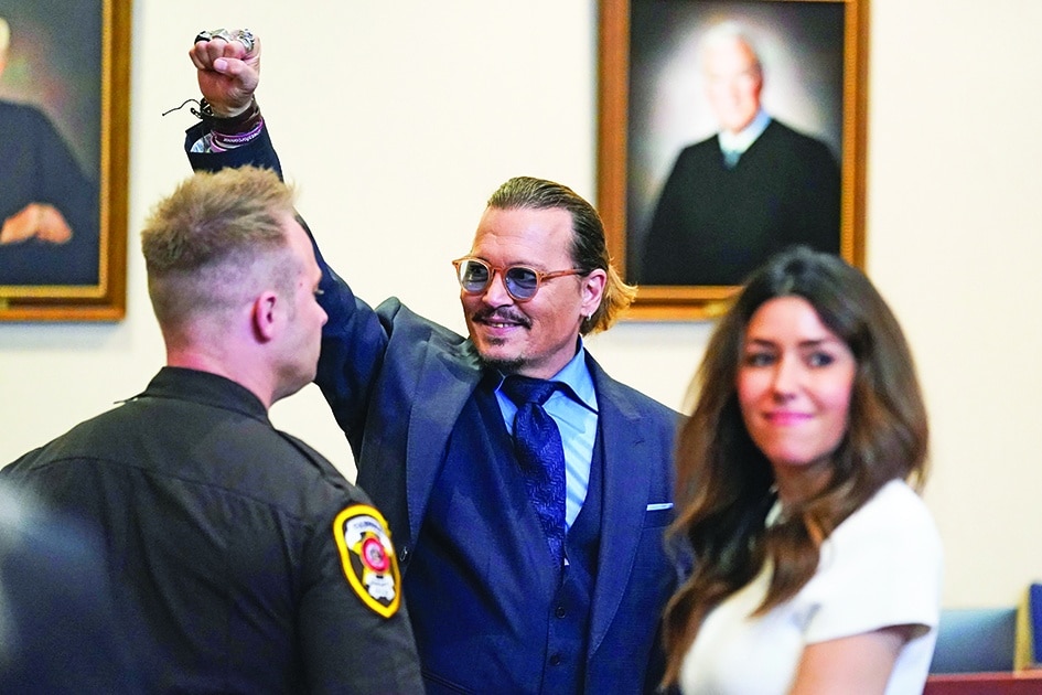 In this file photo US actor Johnny Depp gestures to spectators in court after closing arguments at the Fairfax County Circuit Courthouse in Fairfax, Virginia.—AFP photos
